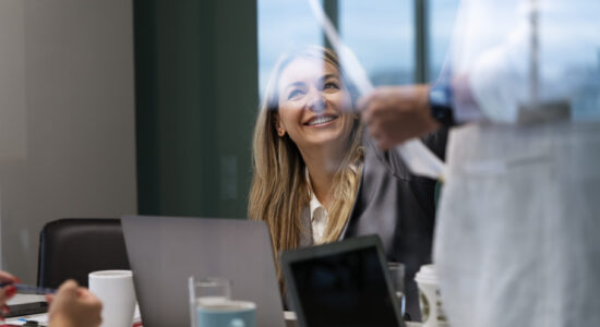 side-view-smiley-woman-work